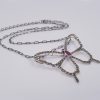 Pendente farfalla con marcassiti griffate e rubino. CD0503
