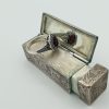 Anello stile retrò con granato africano e marcassiti griffate.  AR0175