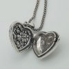Pendente a cuore apribile con perla coltivata e marcassiti griffate, corredato di catena brunita e diamantata.  PD0465 - immagine 3
