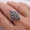 Anello ad intrecci, con agata verde centrale, perle coltivate, smalto e marcassiti griffate. AD2158 - immagine 2